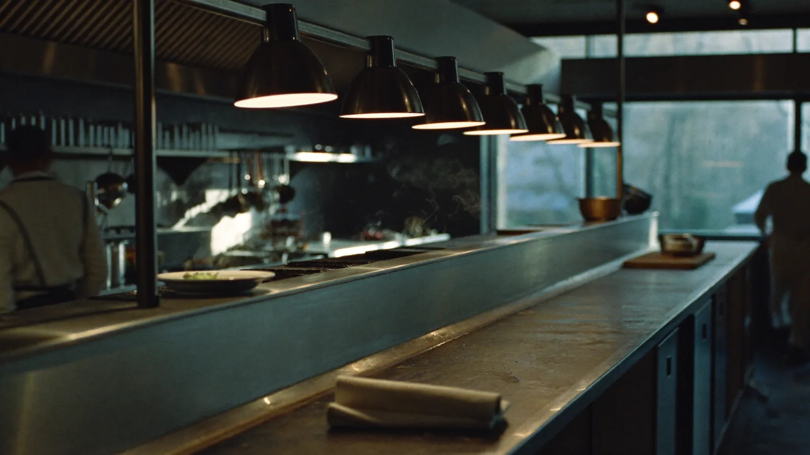 The kitchen pass under heat lamps before service
